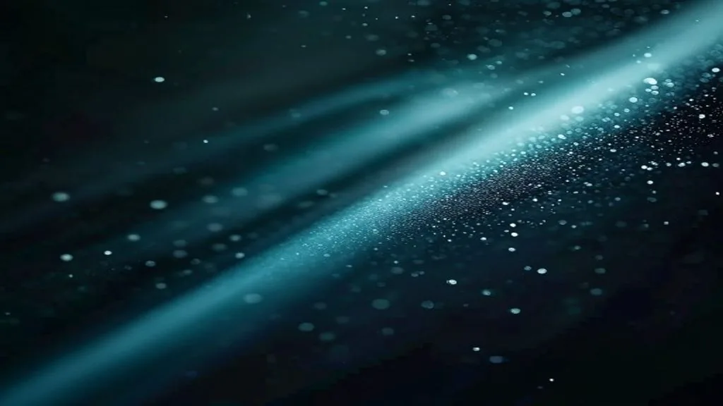 A single beam of light traced across a dark polished surface under low side lighting